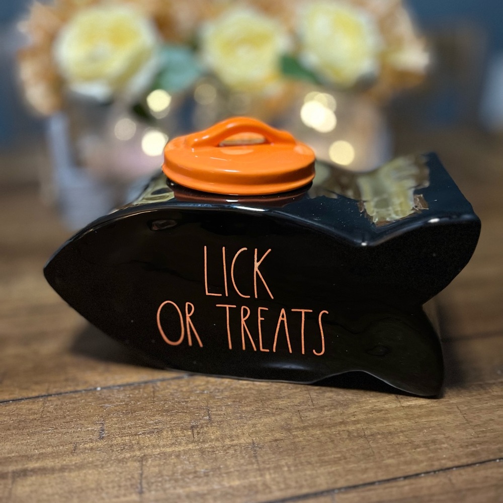 Rae Dunn
Lick Or Tricks Fish Shaped pet Canister.  10w x 5.5”h